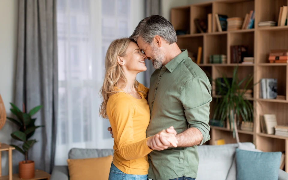 couple dancing at home