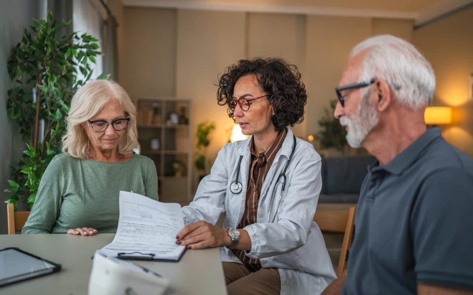doctor talking to caregiver