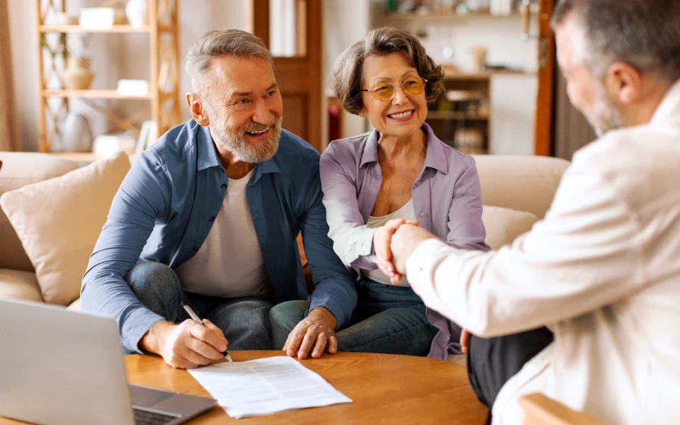 older couple talking to consultant